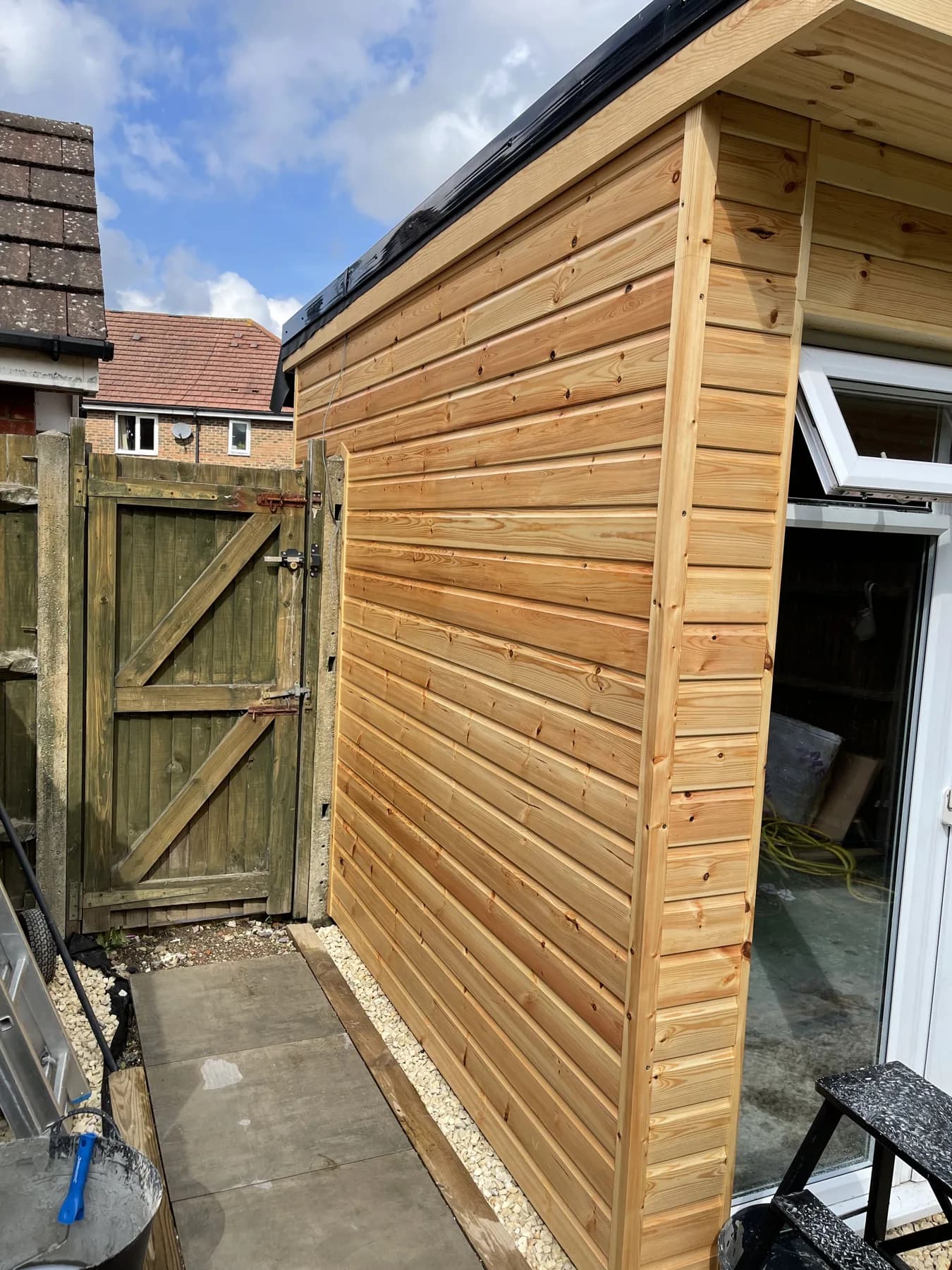 Side view of the timber cladding during the final stages of work.