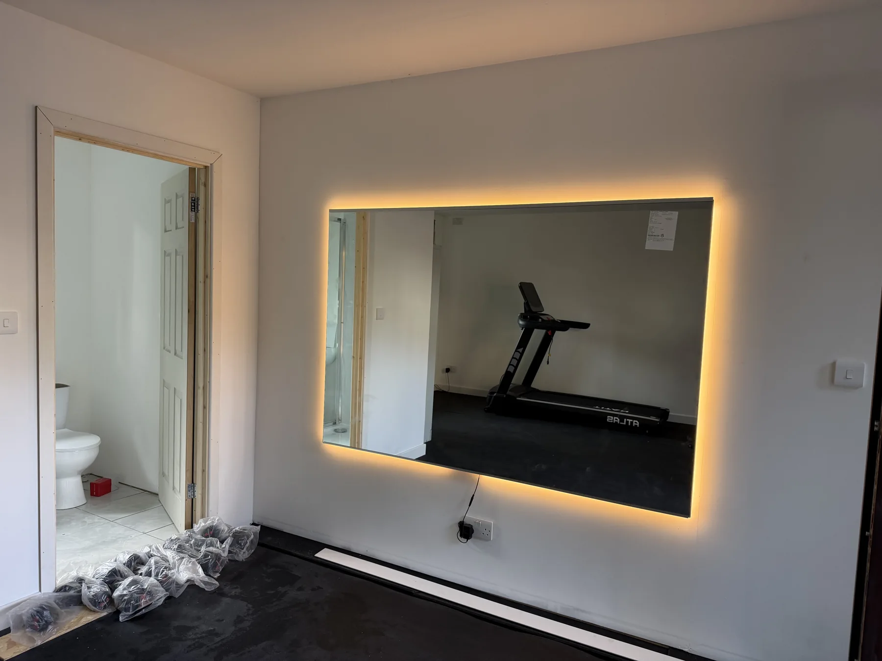 The illuminated mirror, photographed before the final clear-up.