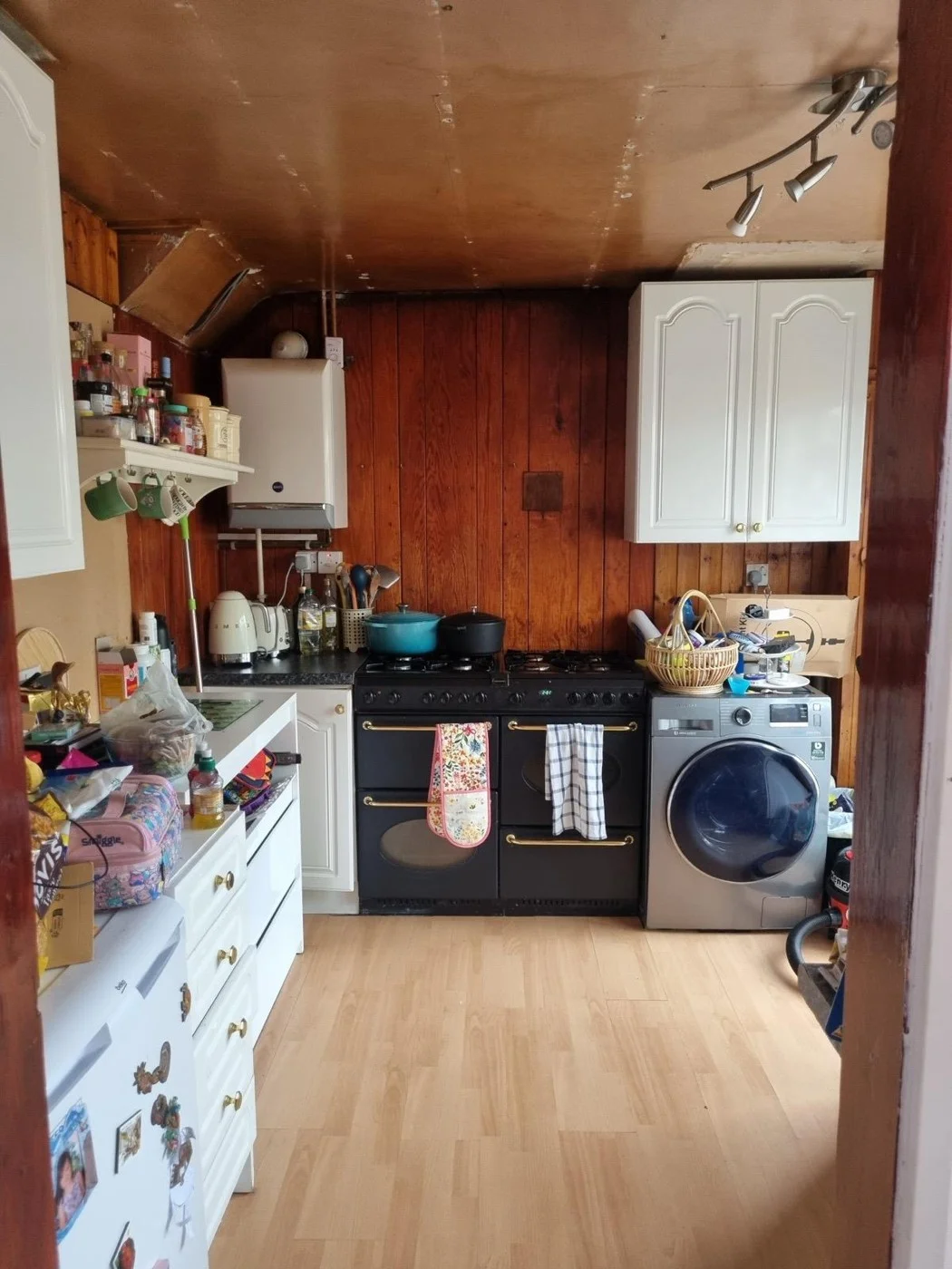 Before — the original kitchen, ahead of both phases.