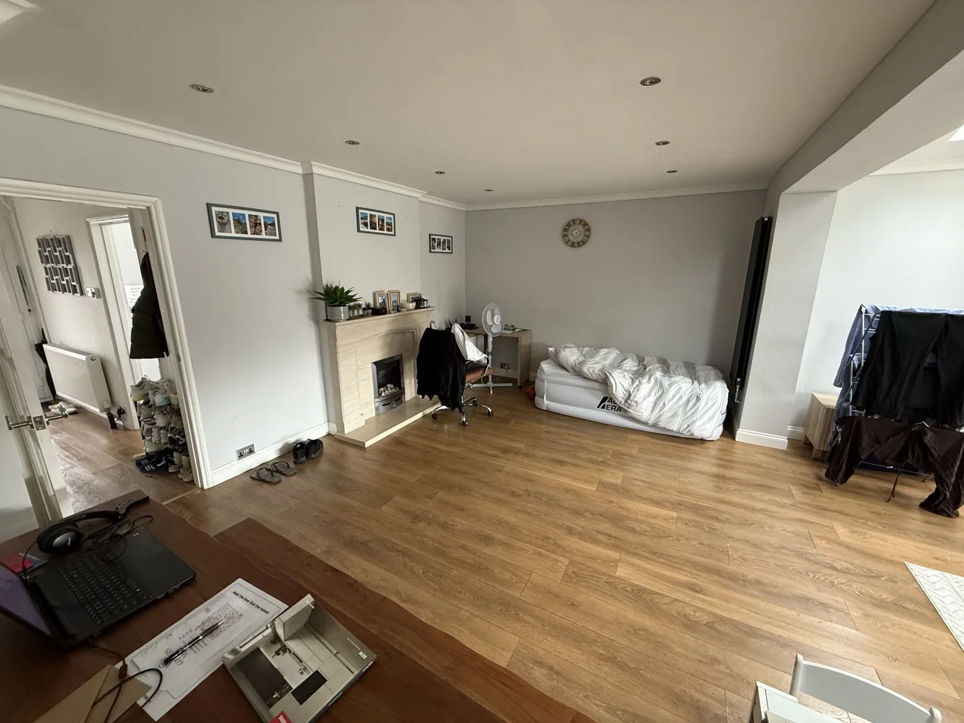 Before — the living space ahead of the kitchen relocation.