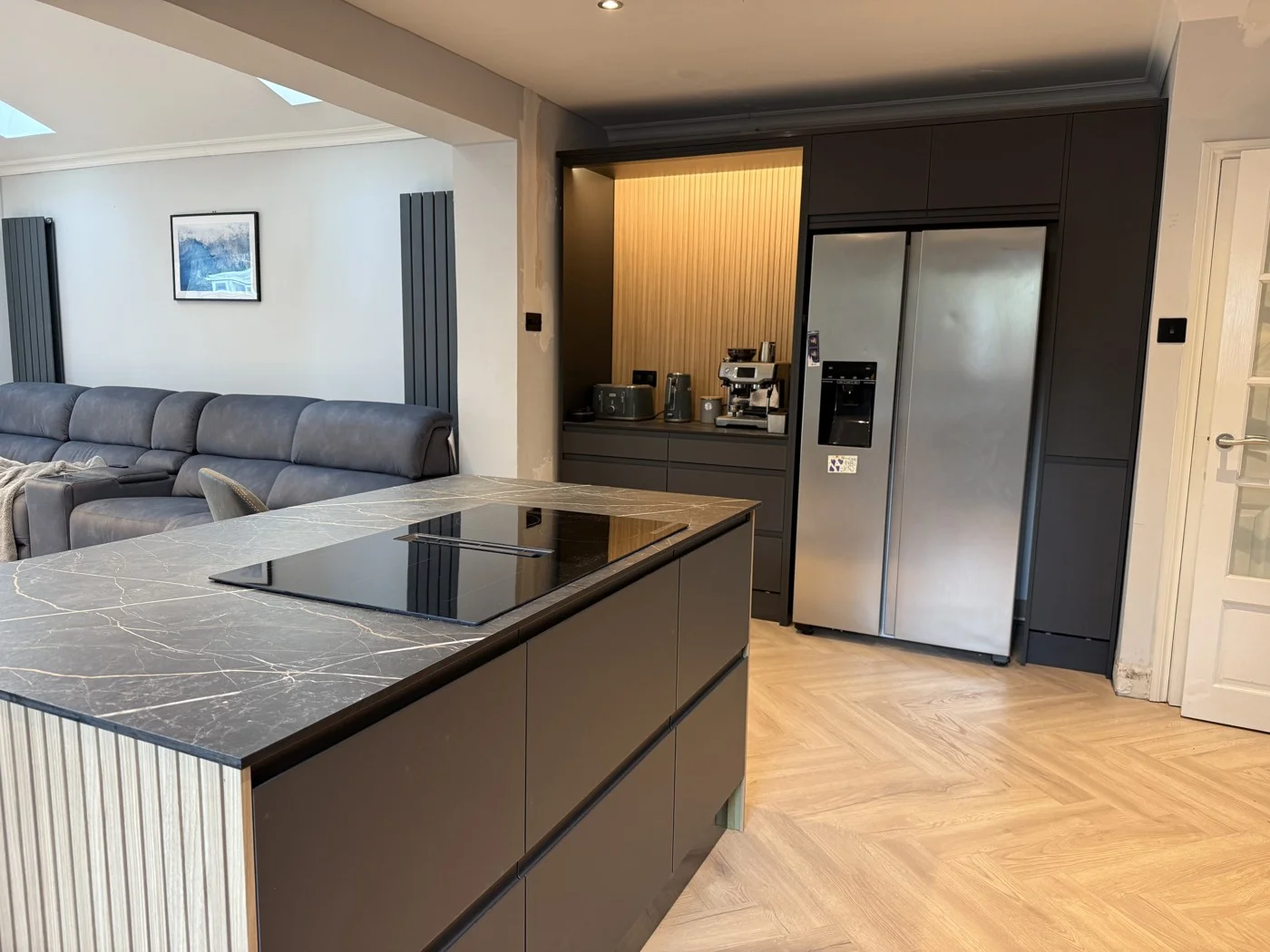 Kitchen island and illuminated coffee area.