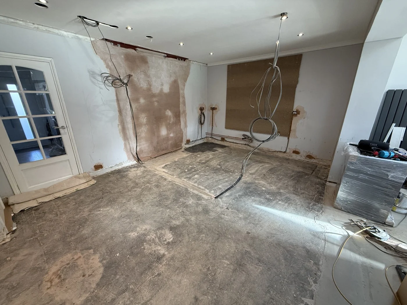 During construction — preparation for the relocated kitchen.